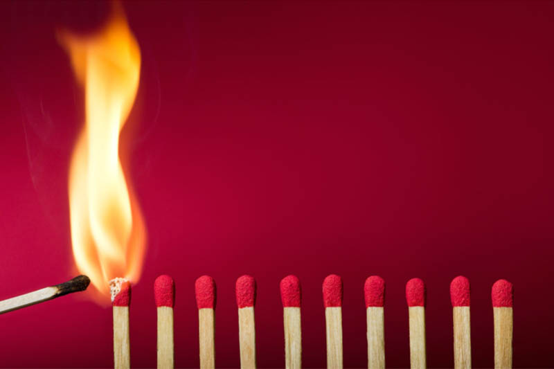 one match lighting a row of matches